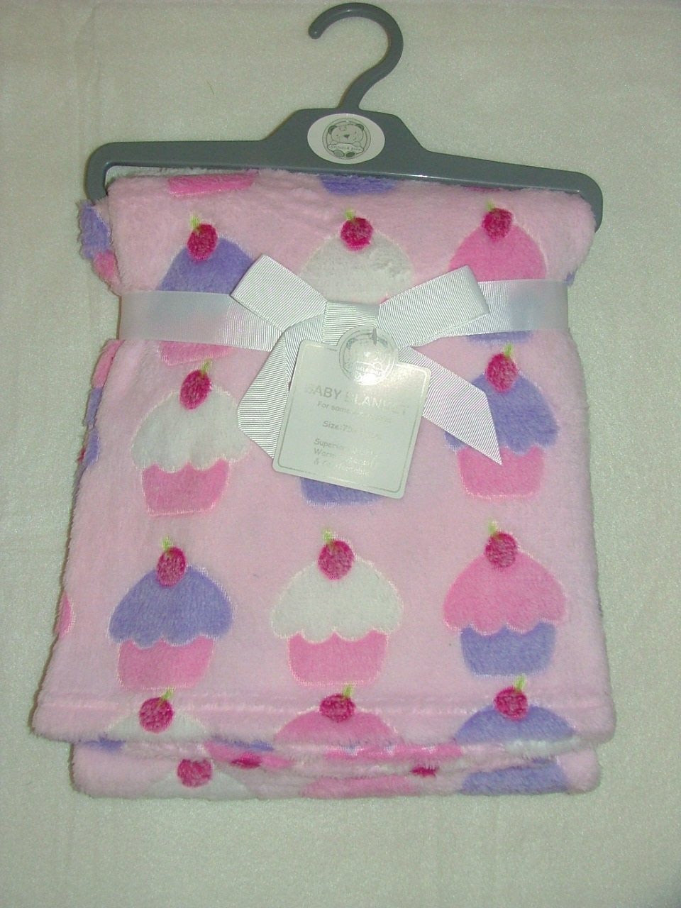 Pink cupcake pram blanket