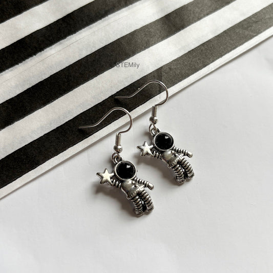 Silver spaceman astronaut drop dangle earrings