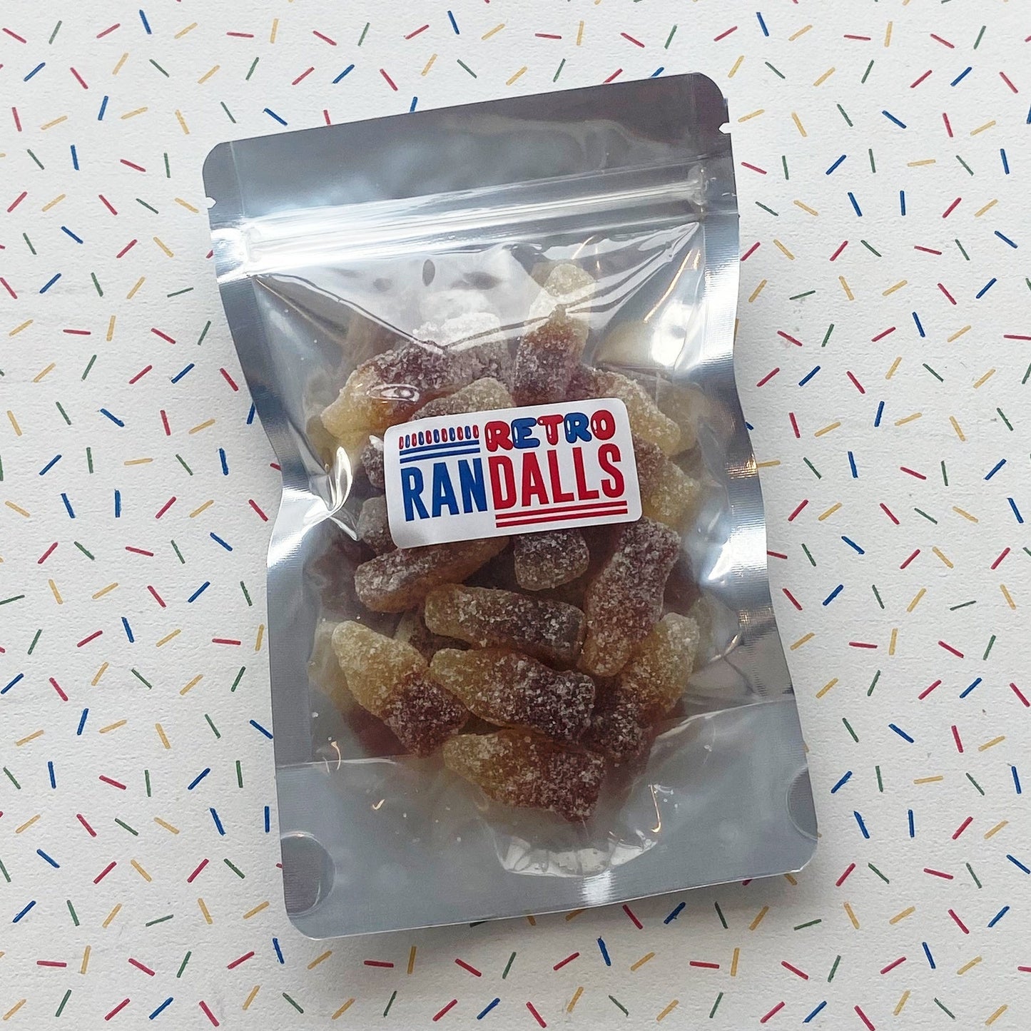 BARRATT FIZZY COLA BOTTLES - 100g (BRITISH)