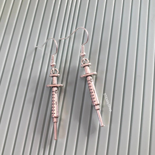 Cool quirky little silver syringe science biology nurse earrings on silver plated hooks