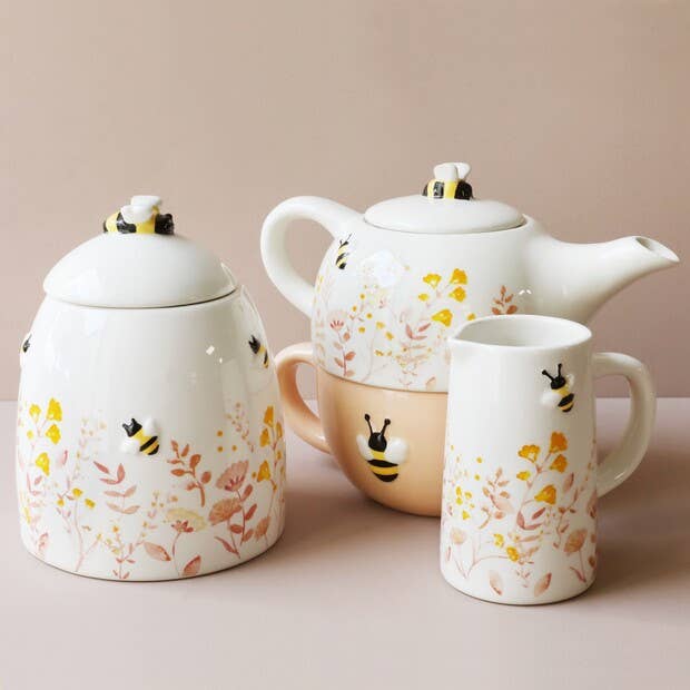Floral Storage Pot blue/dusky pink florals, highlighted by a peppering of yellow