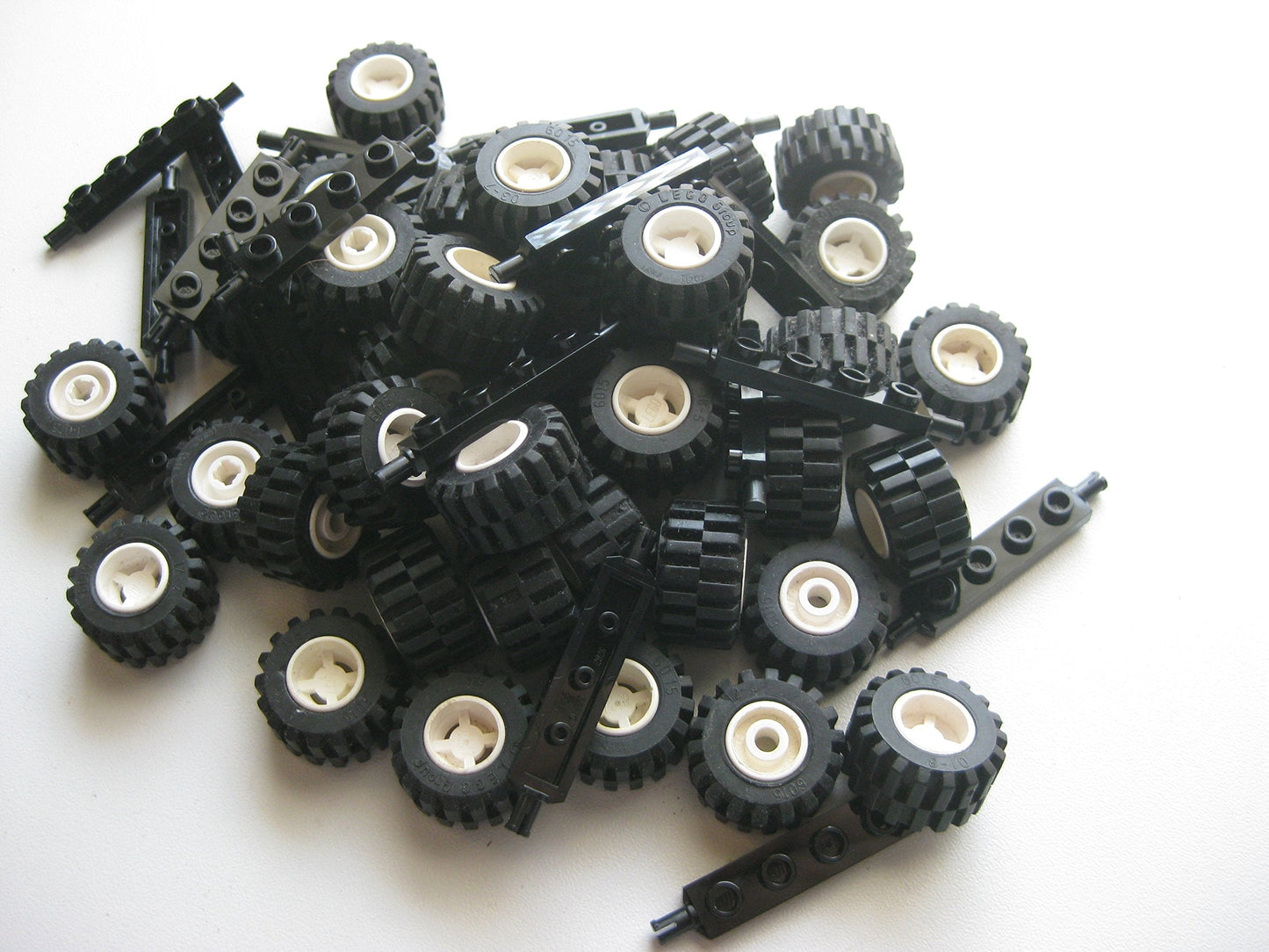 LEGO City Complete Wheel Assembly Lot – 20 Black Axles, 40 Black Tires, 40 White Hubs