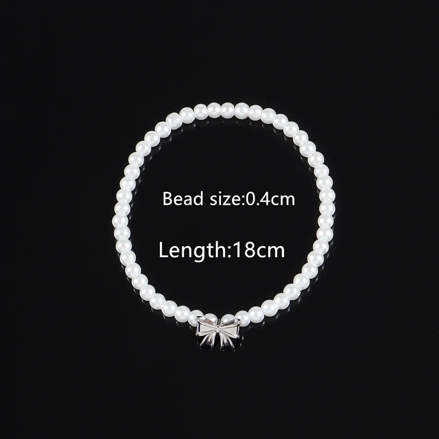 Elegant Simple Style Classic Style Bow Knot Artificial Pearl Copper Beaded Chain Beaded Bracelets Wholesale