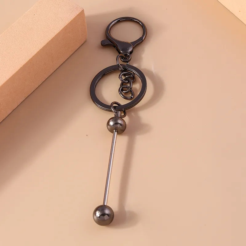 simple style solid color arylic zinc alloy keychain