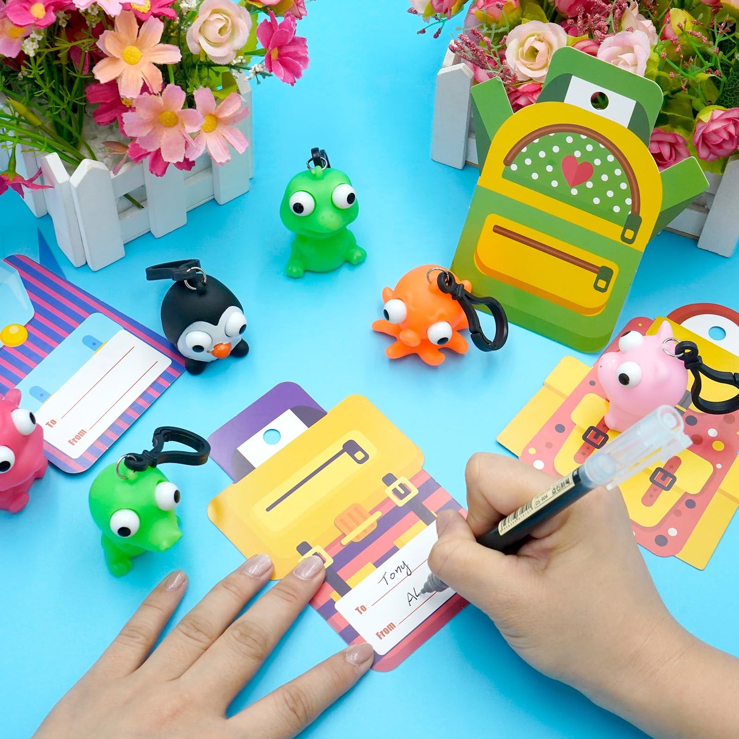 PIONJOY 28-Pack Valentines Cards with Eye-Pop Squeeze Keychains – Classroom Prizes & Gifts