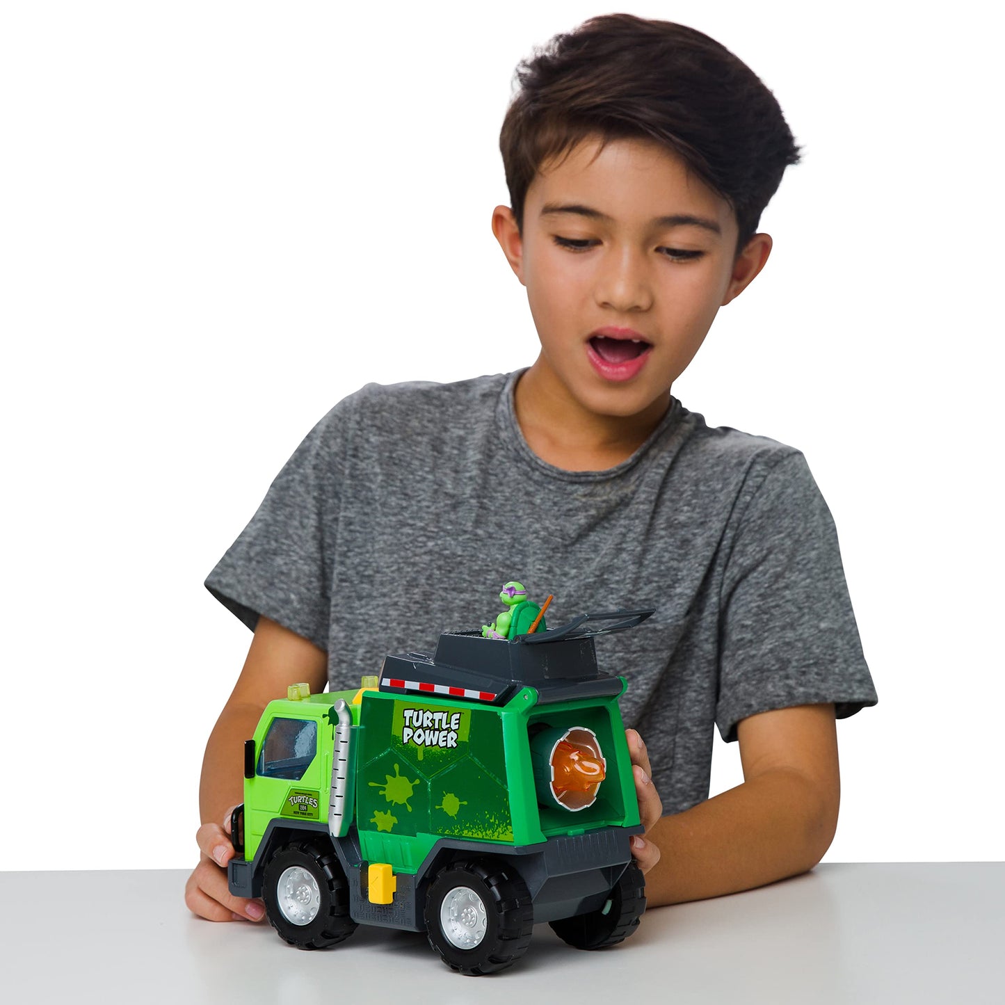 TMNT Thrash N’ Battle Garbage Truck with Lights, Sounds & Sewer Cap Launchers