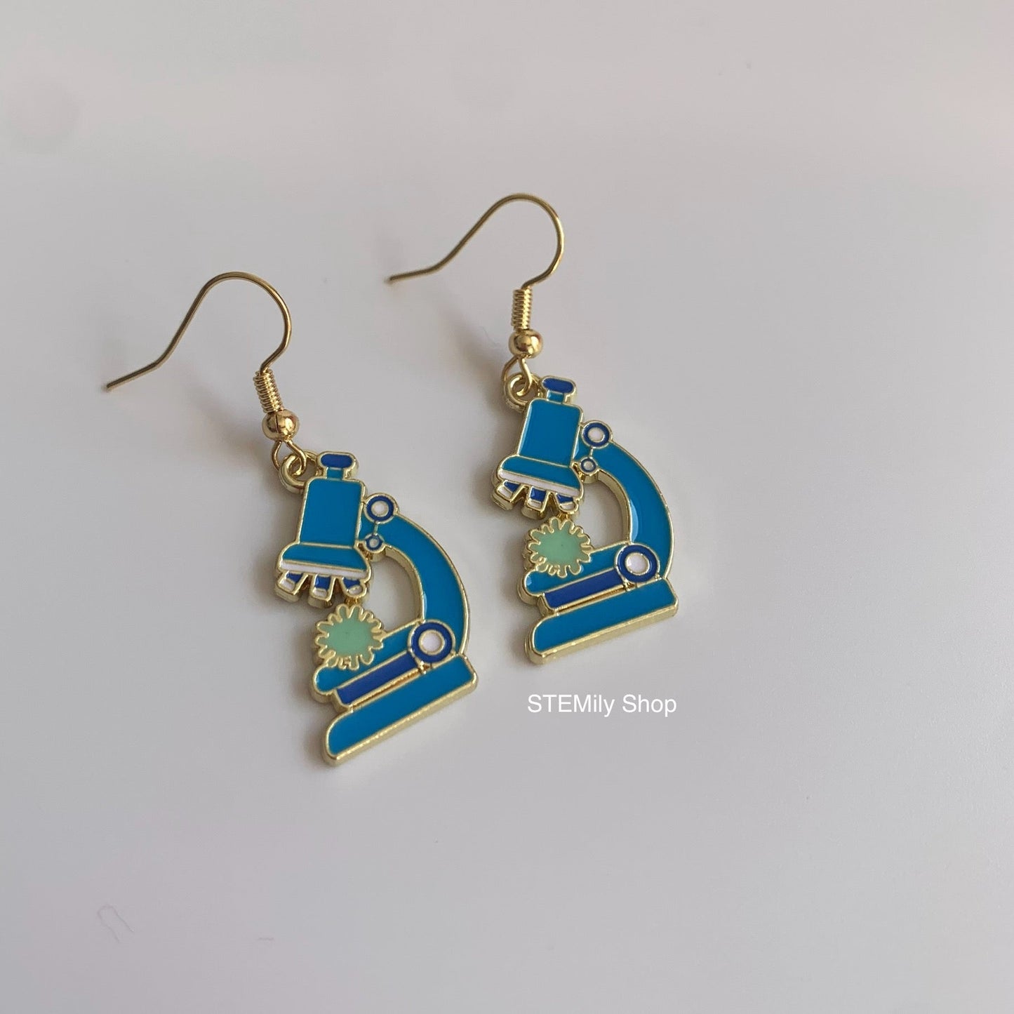 Gold and blue dangle science microscope earrings on gold plated hooks