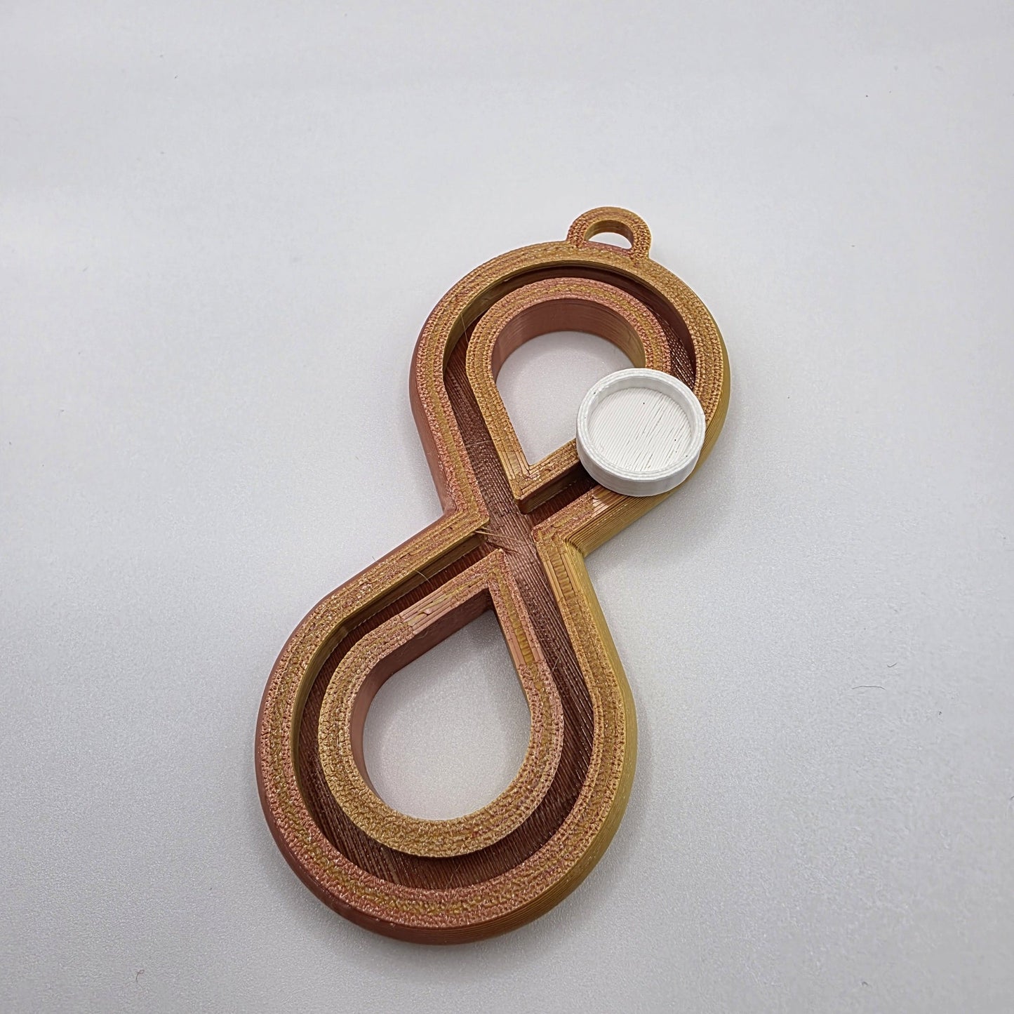 3dFidgets - Infinite Breath a soothing, figure-eight fidget tool designed to help you slow down, regulate your breathing, and find calm anytime, anywhere