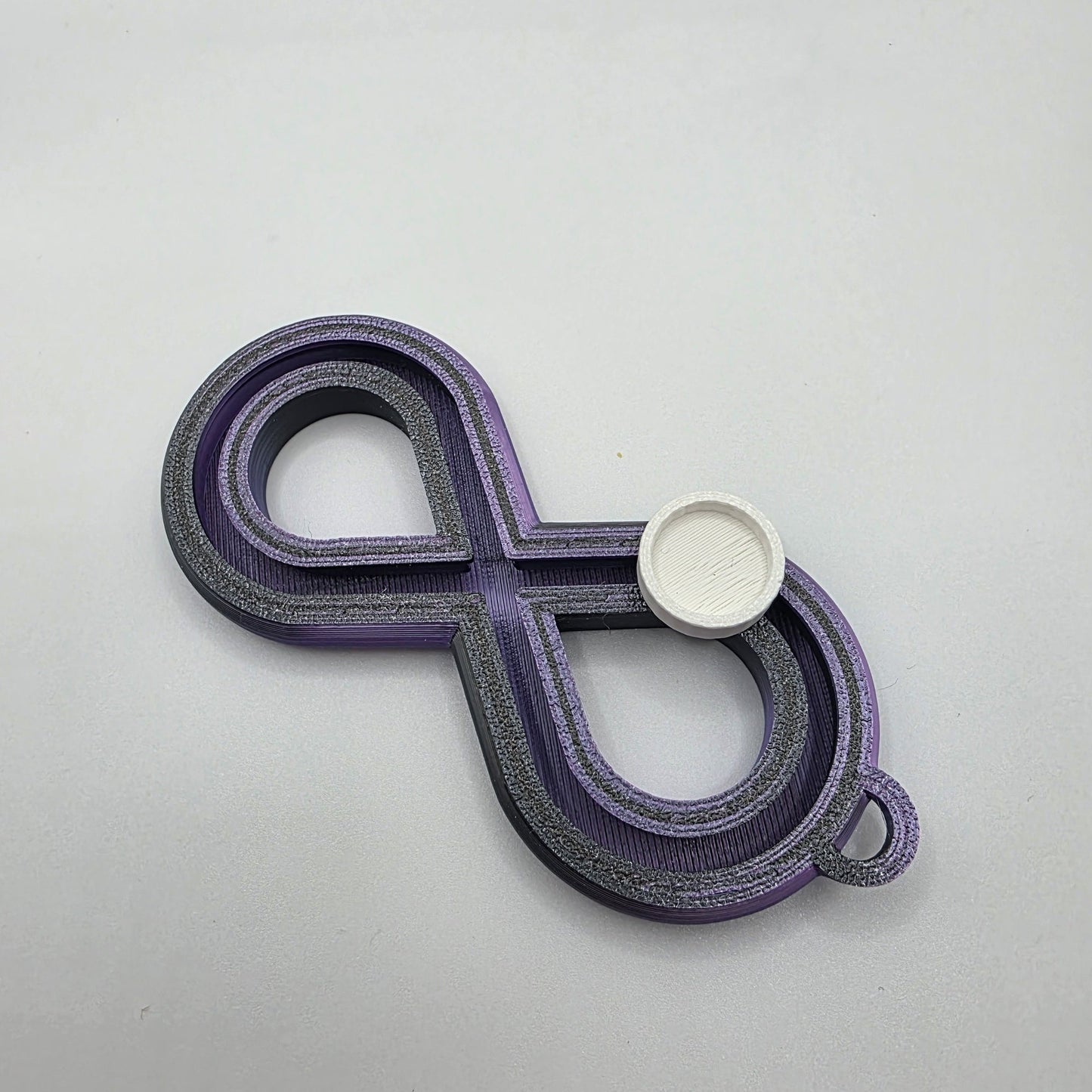 3dFidgets - Infinite Breath a soothing, figure-eight fidget tool designed to help you slow down, regulate your breathing, and find calm anytime, anywhere