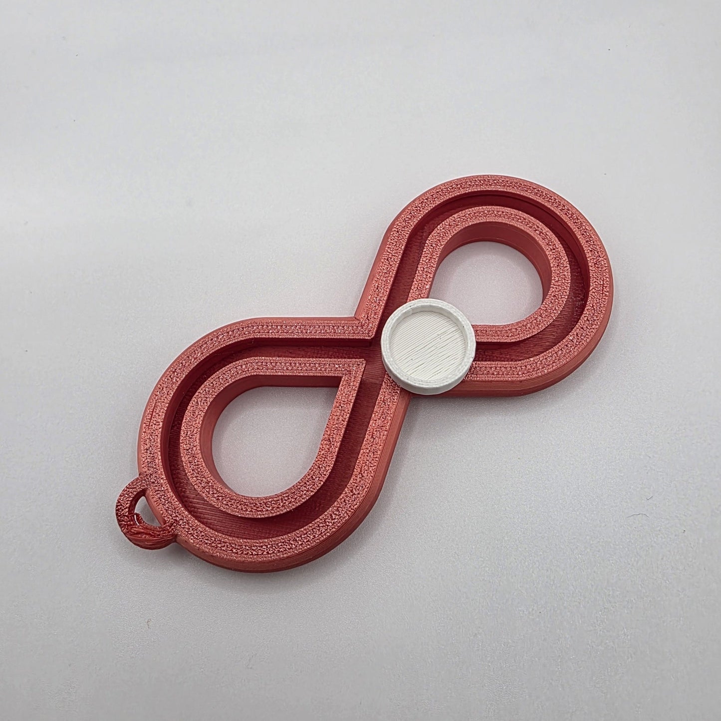 3dFidgets - Infinite Breath a soothing, figure-eight fidget tool designed to help you slow down, regulate your breathing, and find calm anytime, anywhere