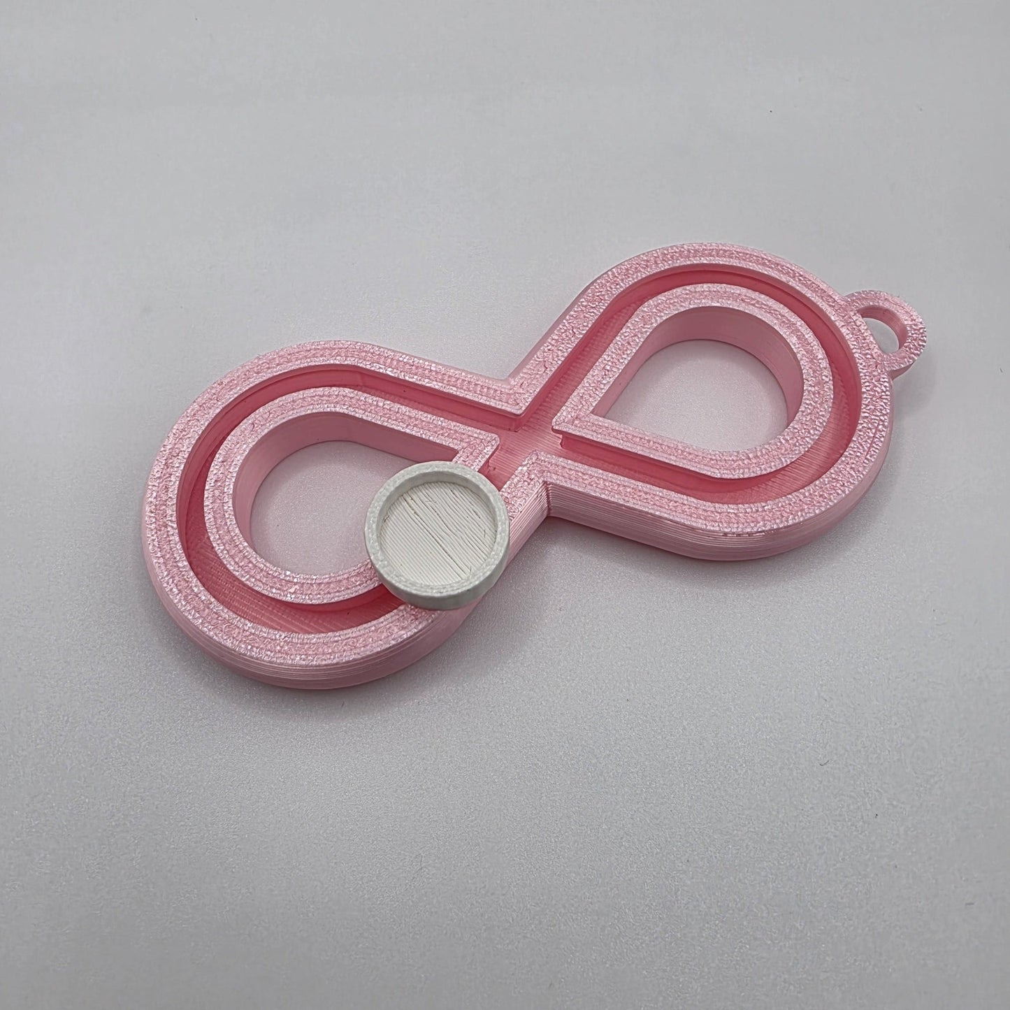 3dFidgets - Infinite Breath a soothing, figure-eight fidget tool designed to help you slow down, regulate your breathing, and find calm anytime, anywhere