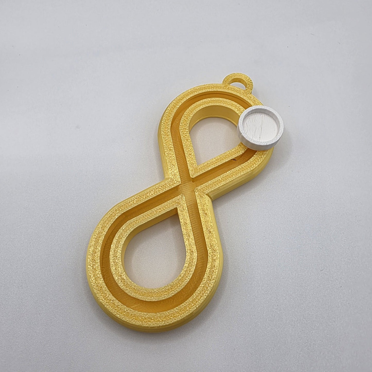 3dFidgets - Infinite Breath a soothing, figure-eight fidget tool designed to help you slow down, regulate your breathing, and find calm anytime, anywhere