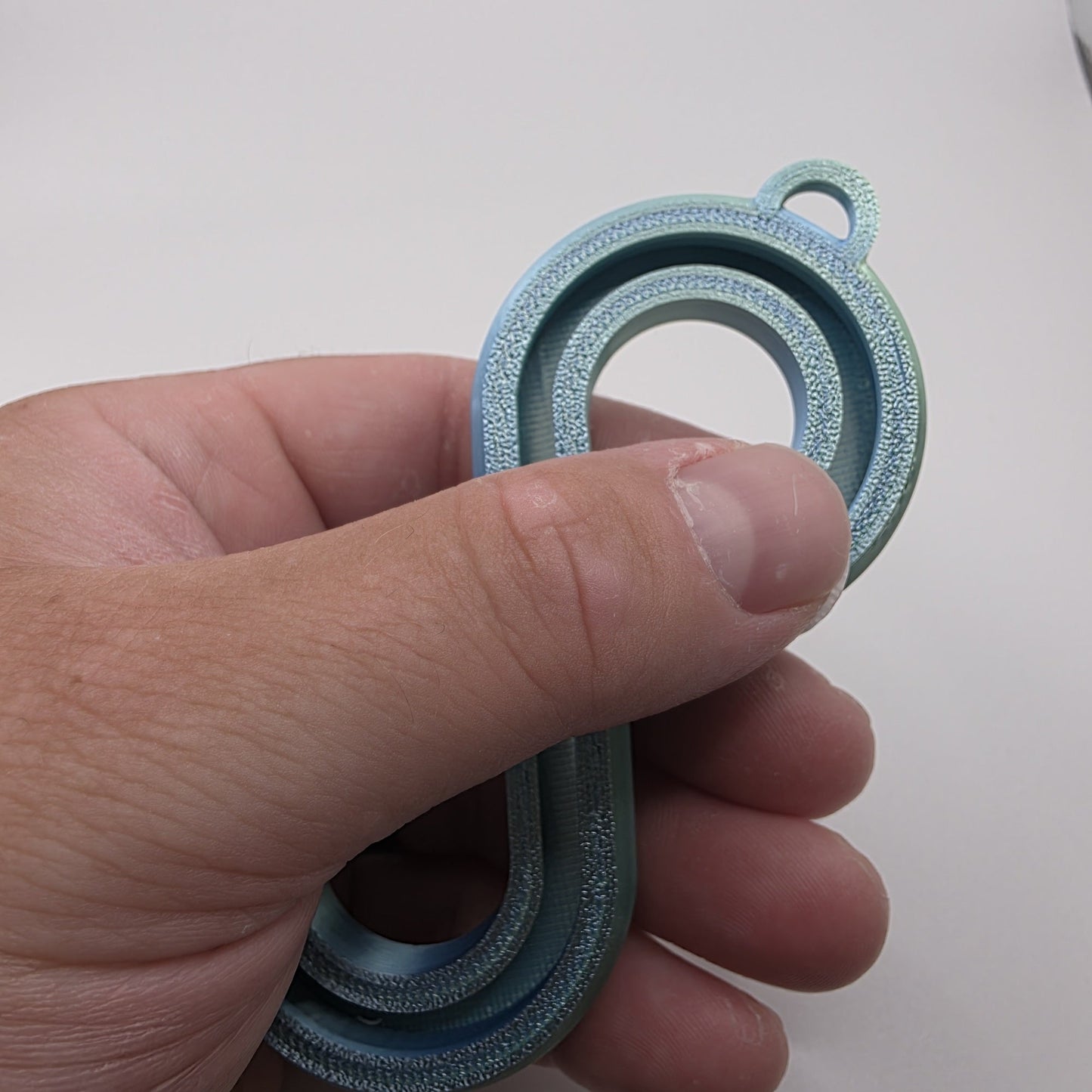 3dFidgets - Infinite Breath a soothing, figure-eight fidget tool designed to help you slow down, regulate your breathing, and find calm anytime, anywhere
