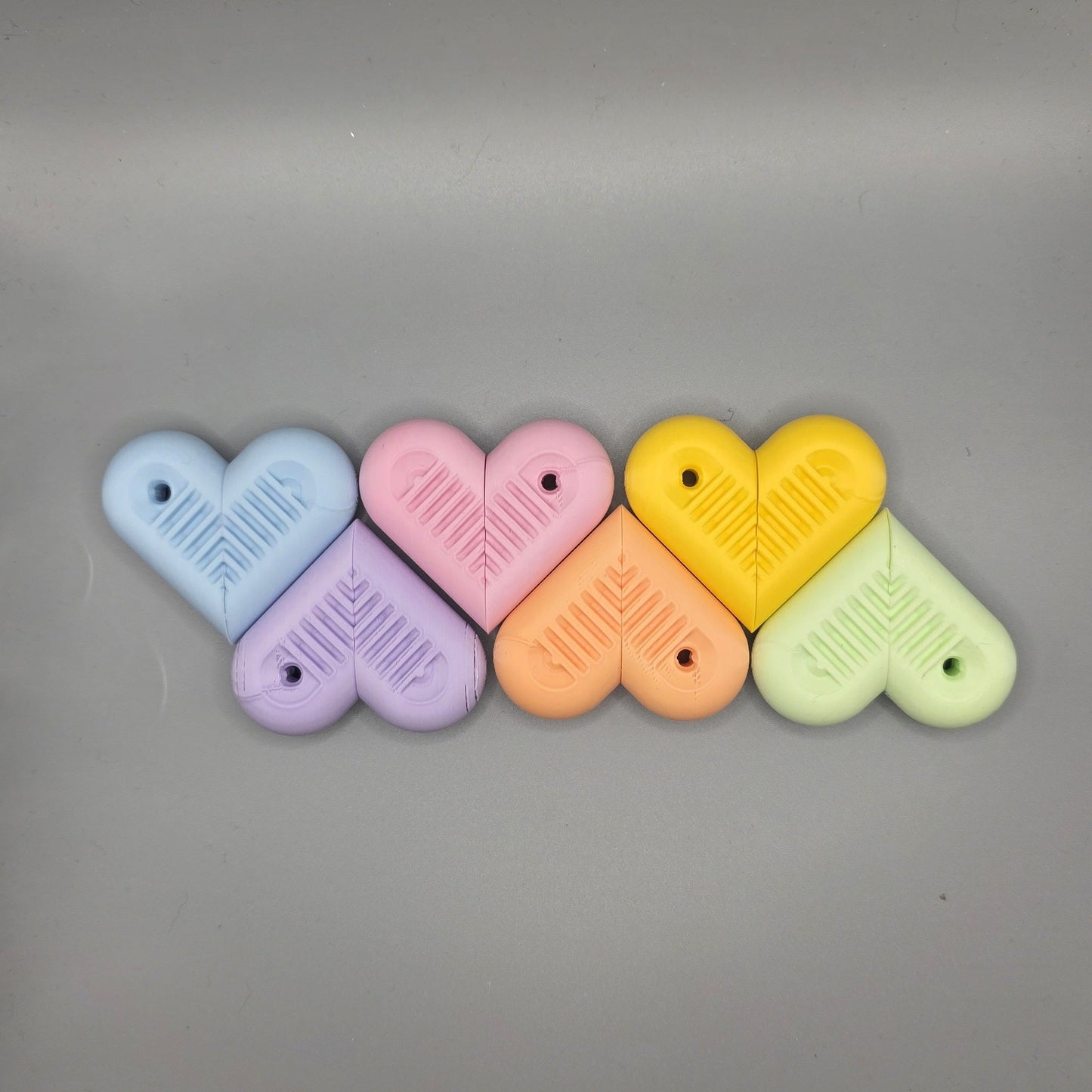 sensit heartSnap - Magnetic snap finger toy in heart shape with textured inside perfect for ADHD, autism and neurodivergent people