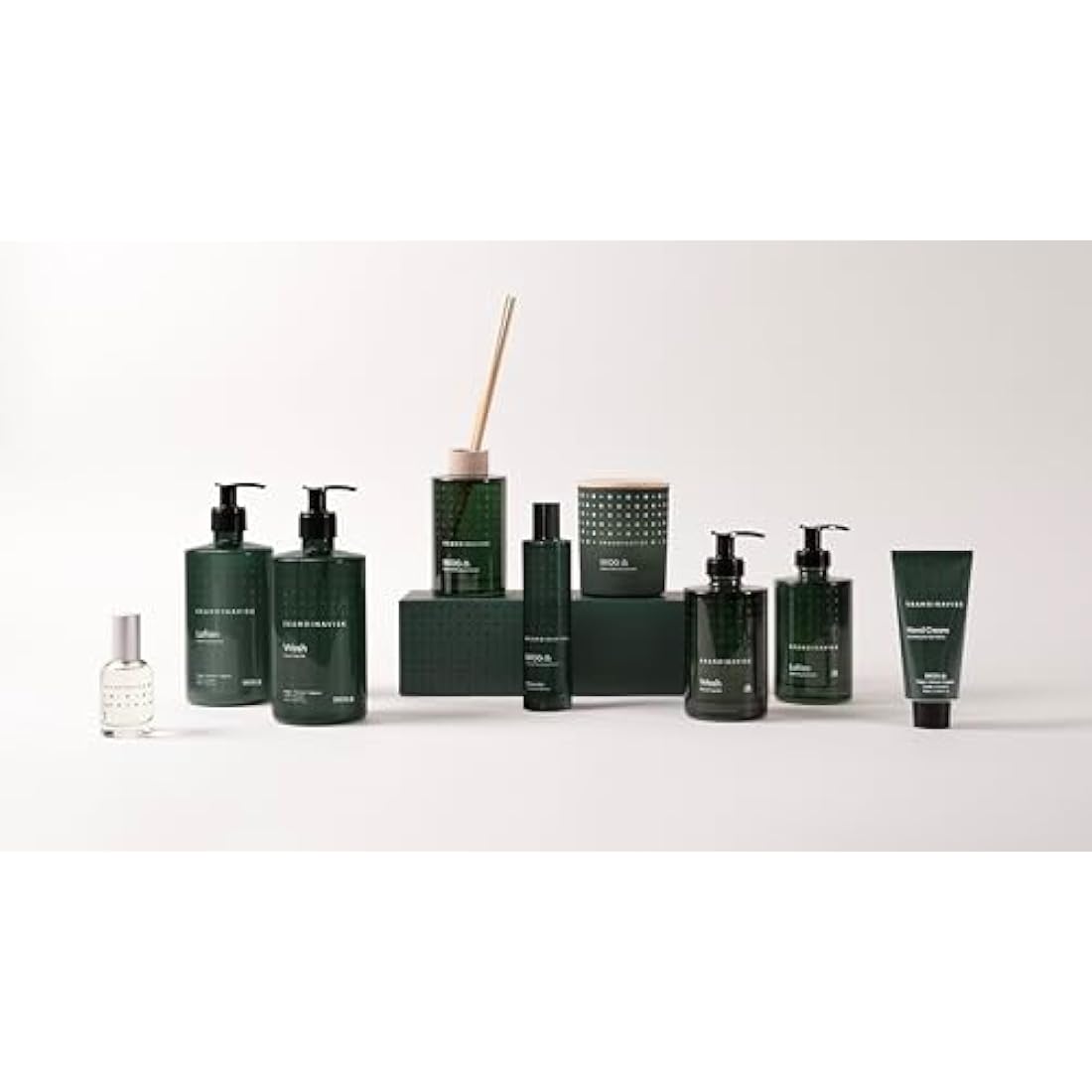 Skandinavisk SKOG ‘Forest’ Hand & body lotion, Scent notes: Pine needles and fir cones, birch sap and woodland lily of the valley, Coloured glass bottle with pump, 200 ml