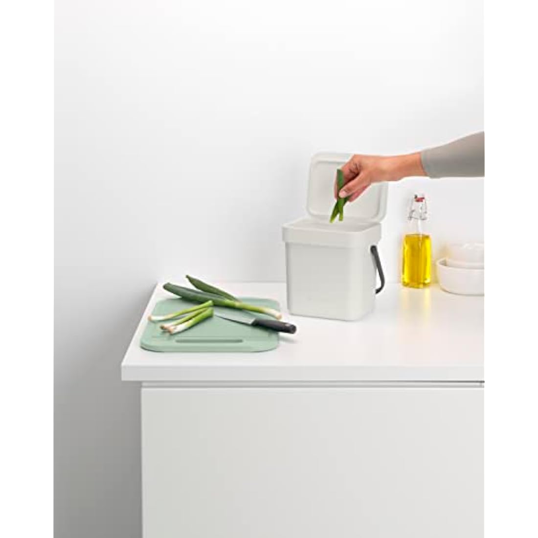 Brabantia - Sort & Go Waste Bin 3L - Small Recycling Bin - Stay Open Lid - Carry Handle - Easy to Clean - for Worktop or Under Kitchen Counter - Food Waste Caddy - Light Grey - 19 x 14 x 18 cm