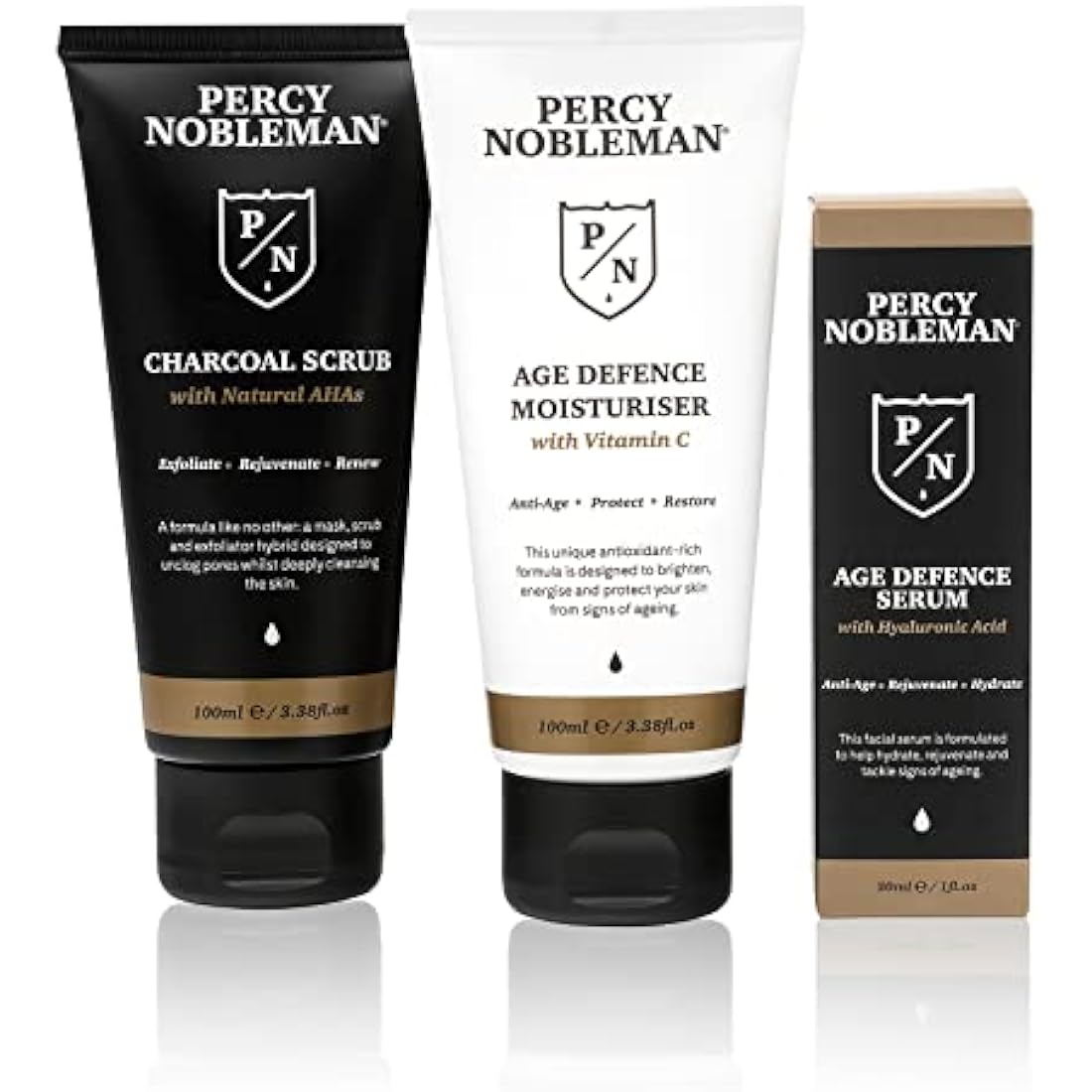 Percy Nobleman Age Defence Kit, a men's skincare set containing Charcoal Face Scrub (with Natural AHAs), ultra-hydrating Facial Serum (with Hyaluronic Acid), and Moisturiser (with Vitamin C)