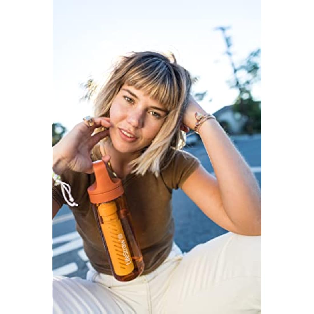 LifeStraw Go Series — BPA-Free Water Filter Bottle for Travel and Everyday Use Removes Bacteria, Parasites and Microplastics, Improves Taste, 22oz Kyoto Orange