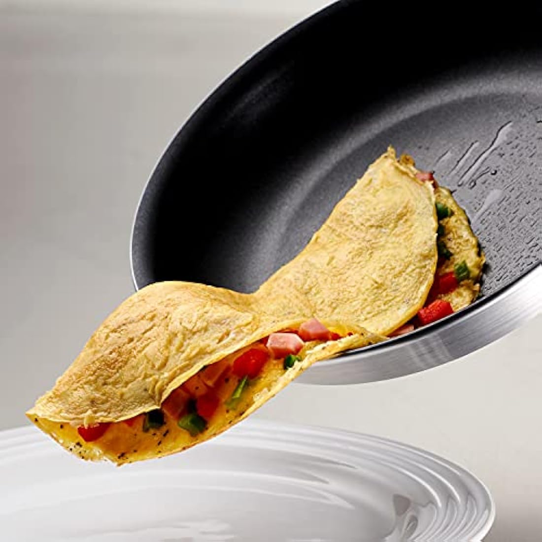 Tramontina Non-Stick Frying Pan with Red Removable Silicone Handle for Electric, Gas and Ceramic Glass Hobs, ‎Aluminium Cookware, Kitchen, 25 cm, 1.9 Litre, 27803601