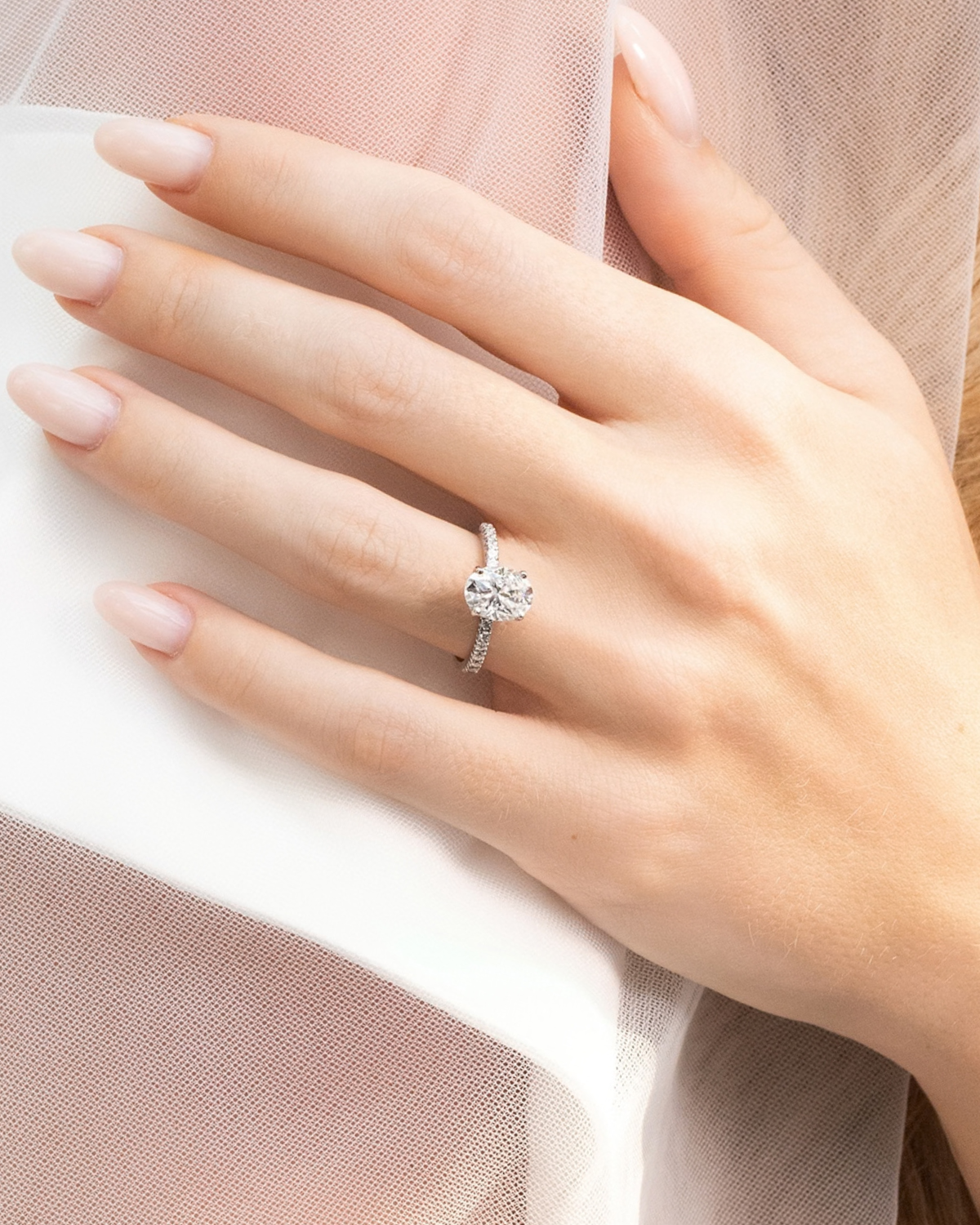 2 ct Oval Solitaire Moissanite Engagement Ring with Pavé Band in Sterling Silver