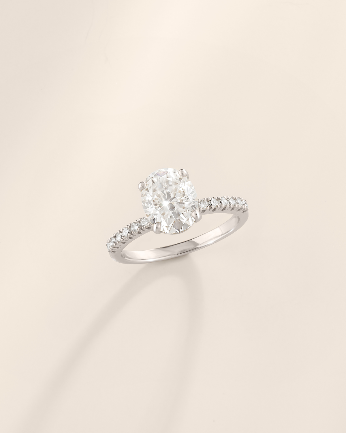 2 ct Oval Solitaire Moissanite Engagement Ring with Pavé Band in Sterling Silver