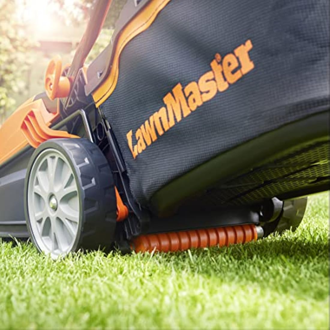 LawnMaster 1400W Electric Lawn Mower with 34cm cutting width, ideal for small to medium sized lawns. With 6 adjustable cutting heights and rear roller for striped finish, 2 year guarantee