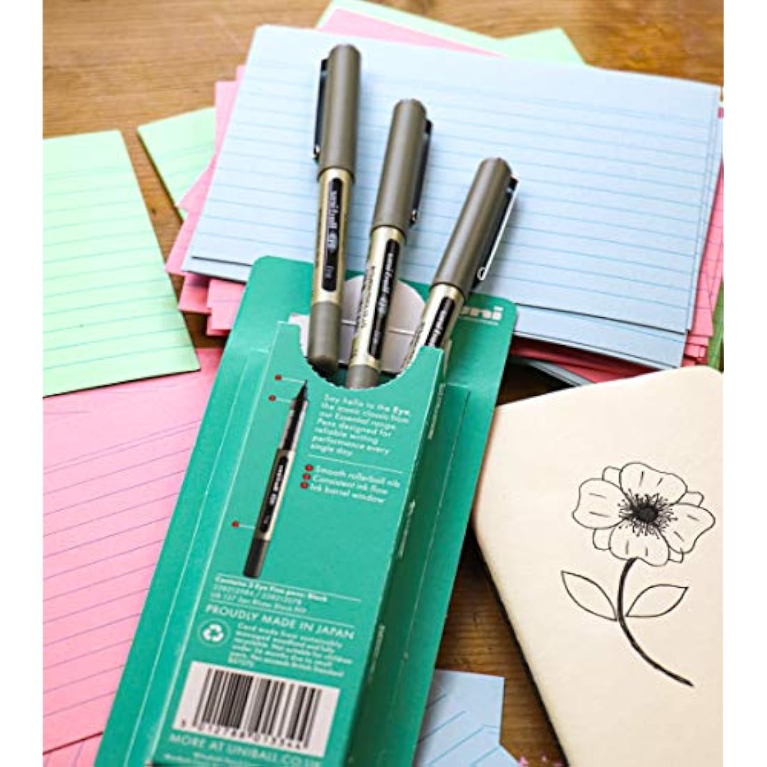 uni-ball UB-157 Eye Rollerball Pens. Premium Fine 0.7mm Ballpoint Tip for Super Smooth Handwriting, Drawing, Art, Crafts and Colouring. Fade and Water Resistant Liquid Uni Super Ink. 5 Pack Assorted