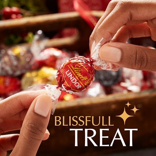 Lindt Lindor Assorted Chocolate Truffles Bag - Approx 80 balls, 1kg - Chocolate Truffles with a Smooth Melting Filling - Gift Present or Sharing Box - Easter, Birthday, Congratulations