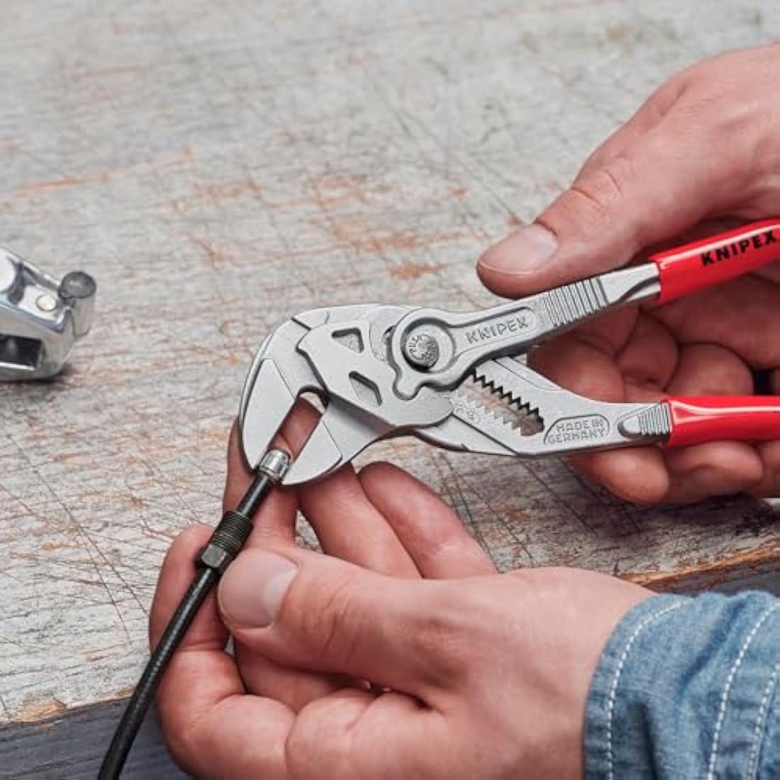 Knipex Pliers Wrench pliers and a wrench in a single tool chrome-plated, plastic coated 180 mm 86 03 180