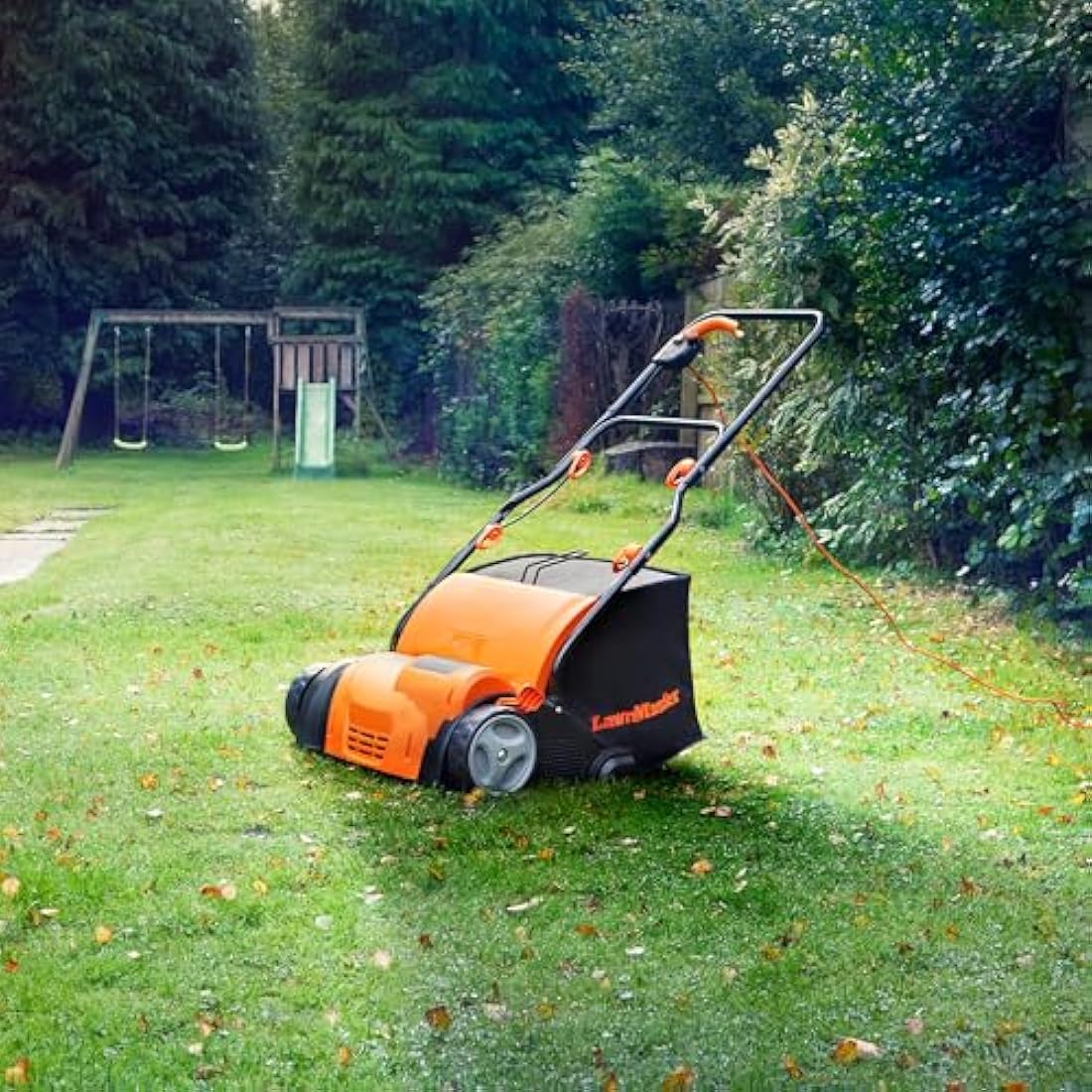 LawnMaster 1350W lawn scarifier, lawn rake, aerator. Electric scarifier with 33cm working width, interchangeable attachments, adjustable working depth and 40L collection bag, With 10m long cable.