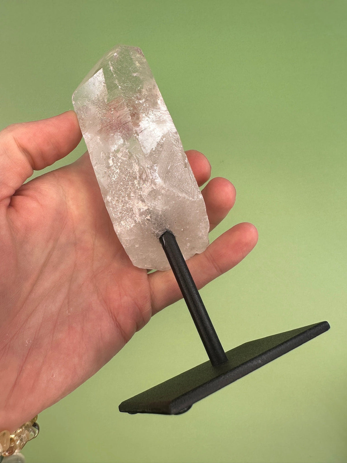 Clear quartz - Rough point on a stand