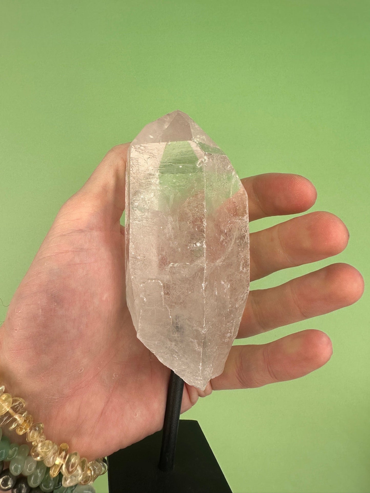 Clear quartz - Rough point on a stand