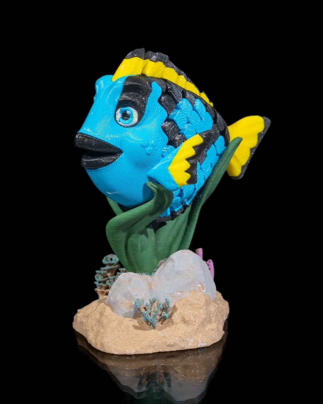 Flexi Dolores, The blue Tang fish fidget toy with stand