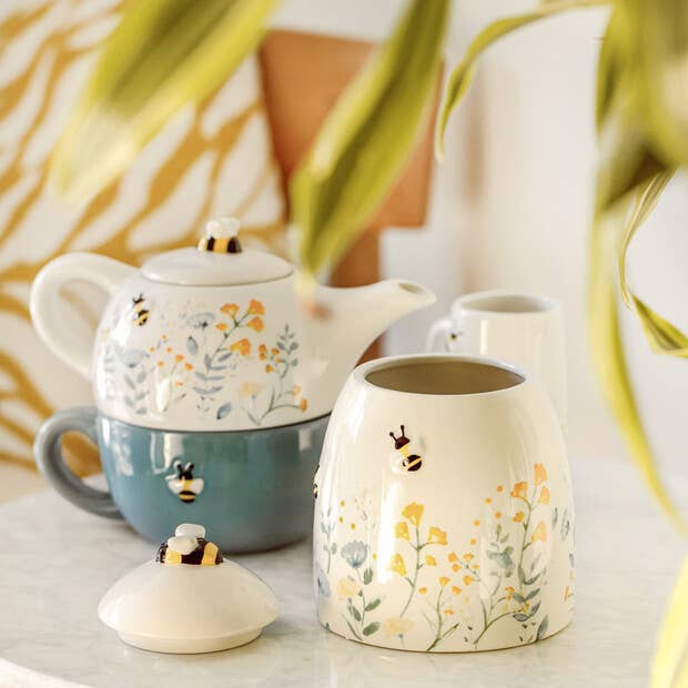 Floral Storage Pot blue/dusky pink florals, highlighted by a peppering of yellow