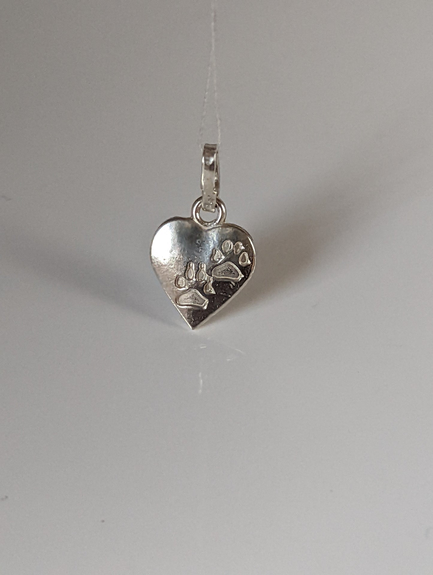 Silver Steed Paw Print on Heart Silver Pendant