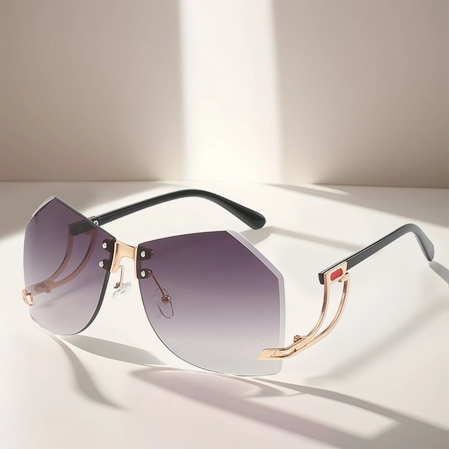 New Fashionable Frameless Sunglasses for Women's Personality Trend Hollow out Mirror Legs Irregular Ocean Lens Glasses UV400