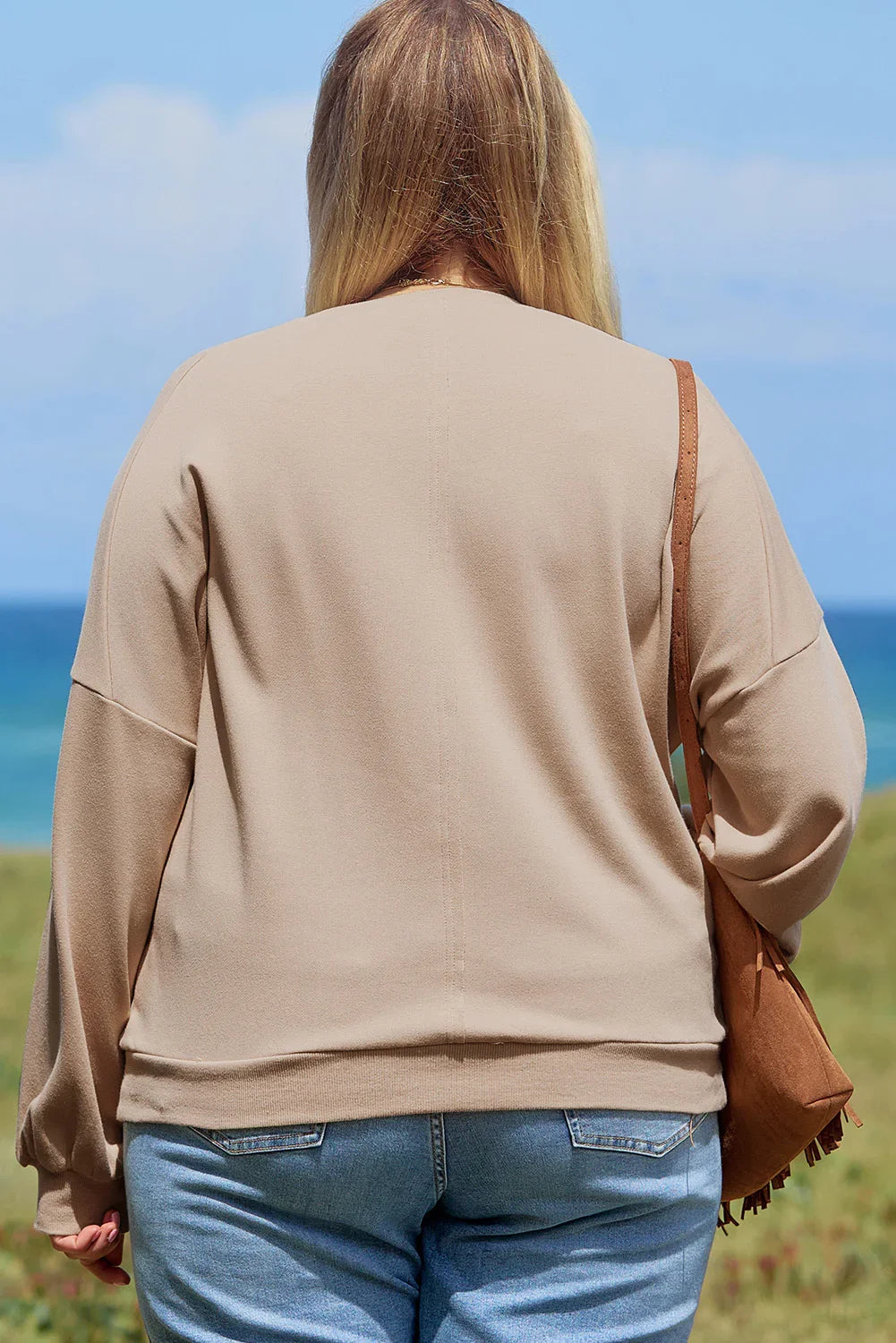 A pale khaki plus-size sweatshirt featuring a floral peace sign graphic and a Washed Terry Finish