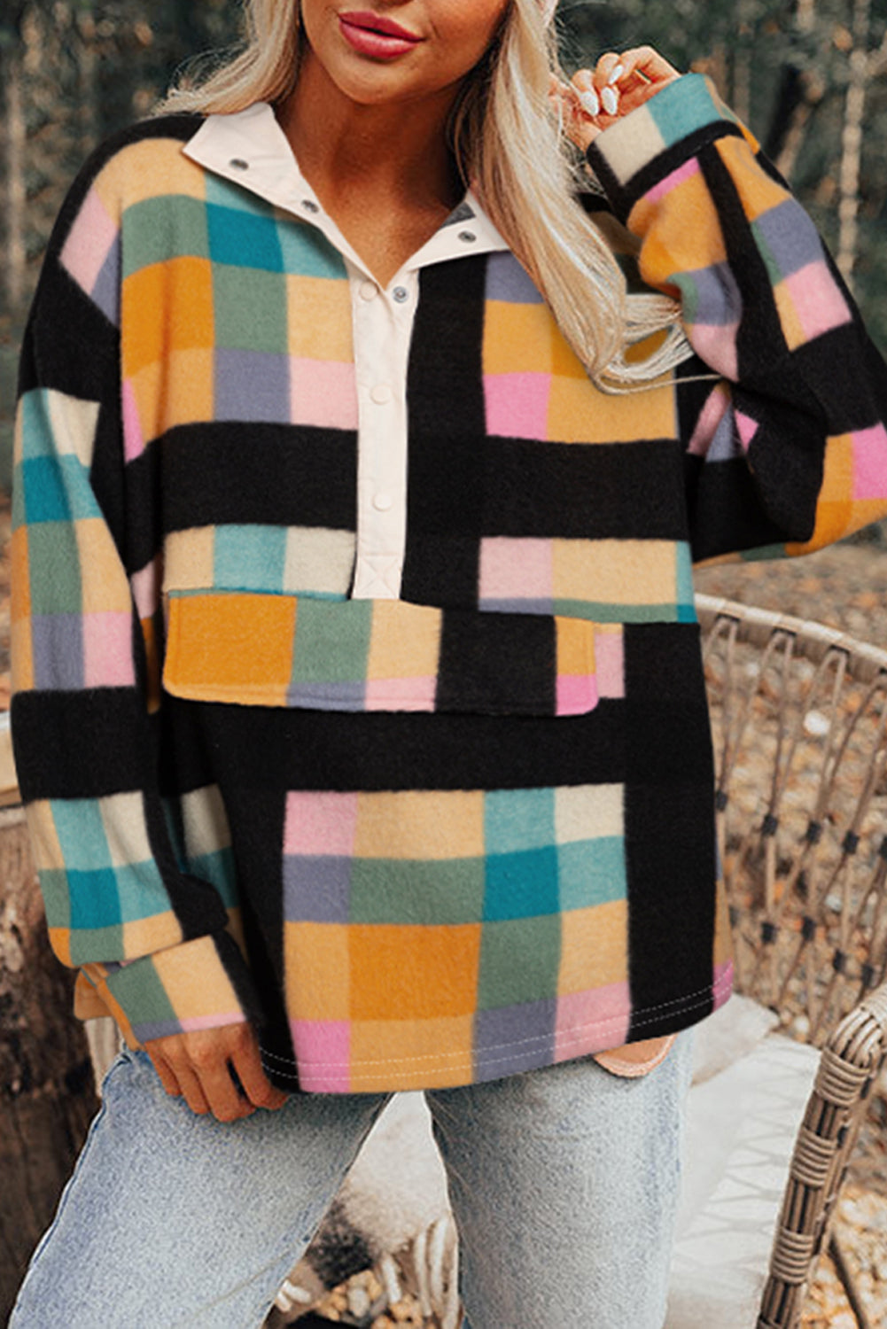 Cozy Black Sweatshirt with Plaid Print, Pockets, and Half Button Front