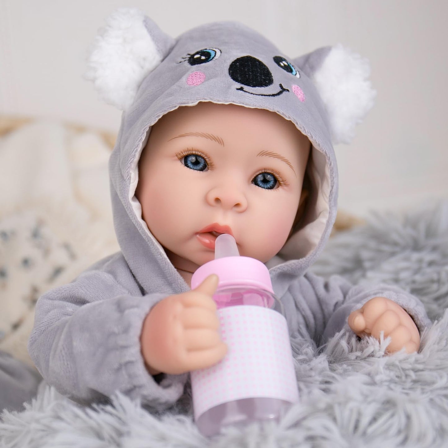 Aori 17-Inch Lifelike Baby Doll — Realistic Soft Body, Grey Outfit | Role Play & Adoption Day