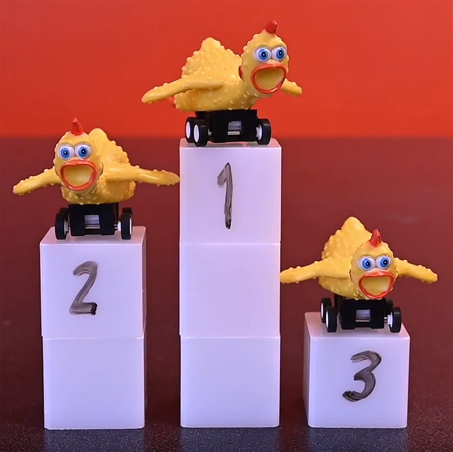 Archie McPhee Racing Rubber Chickens – 3 Piece Set | Pull-Back Tabletop Fun