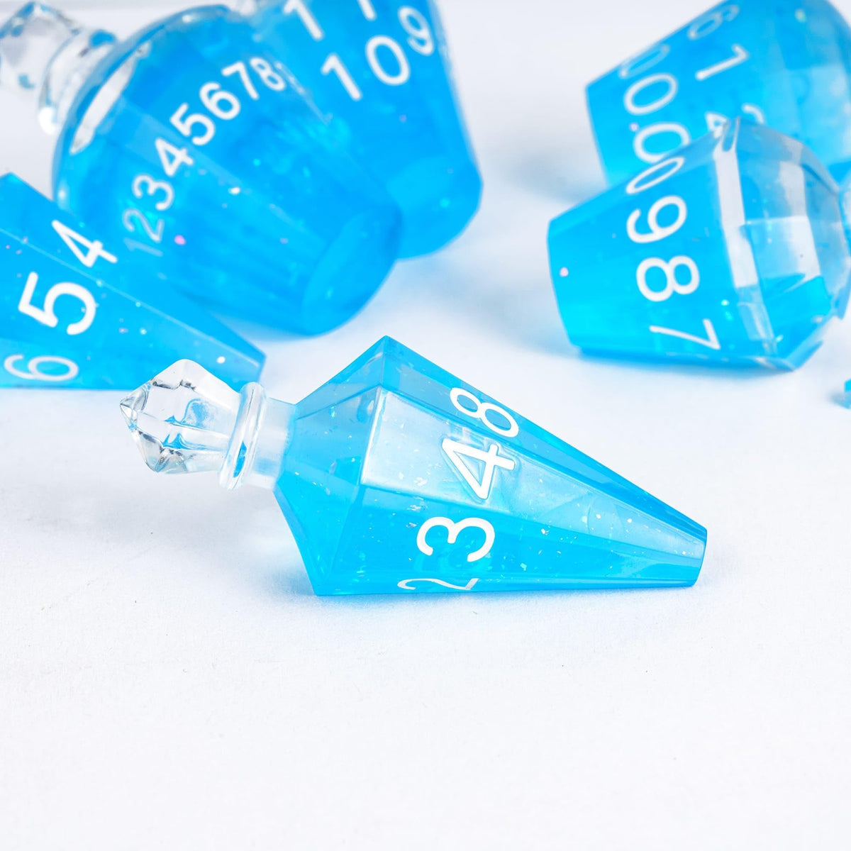 CRITALLIC 7-Piece Potion DND Dice Set — Transparent Blue Bottle Polyhedral Dice for D&D & TTRPGs