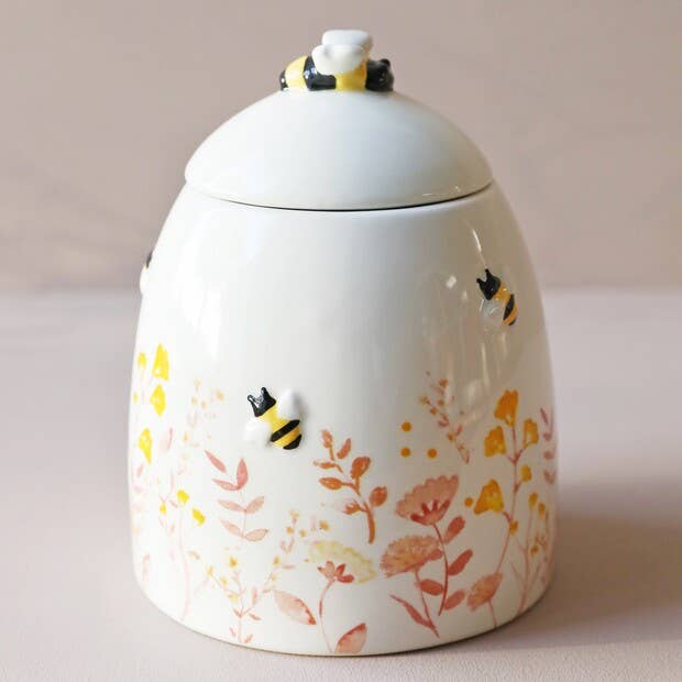 Floral Storage Pot blue/dusky pink florals, highlighted by a peppering of yellow