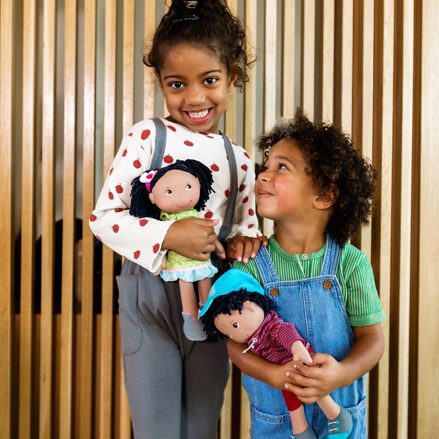 HABA Cari 12in Black Baby Doll - Embroidered Face, Removable Green Dress, Machine Washable
