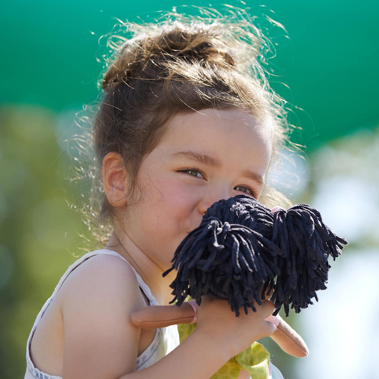 HABA Cari 12in Black Baby Doll - Embroidered Face, Removable Green Dress, Machine Washable