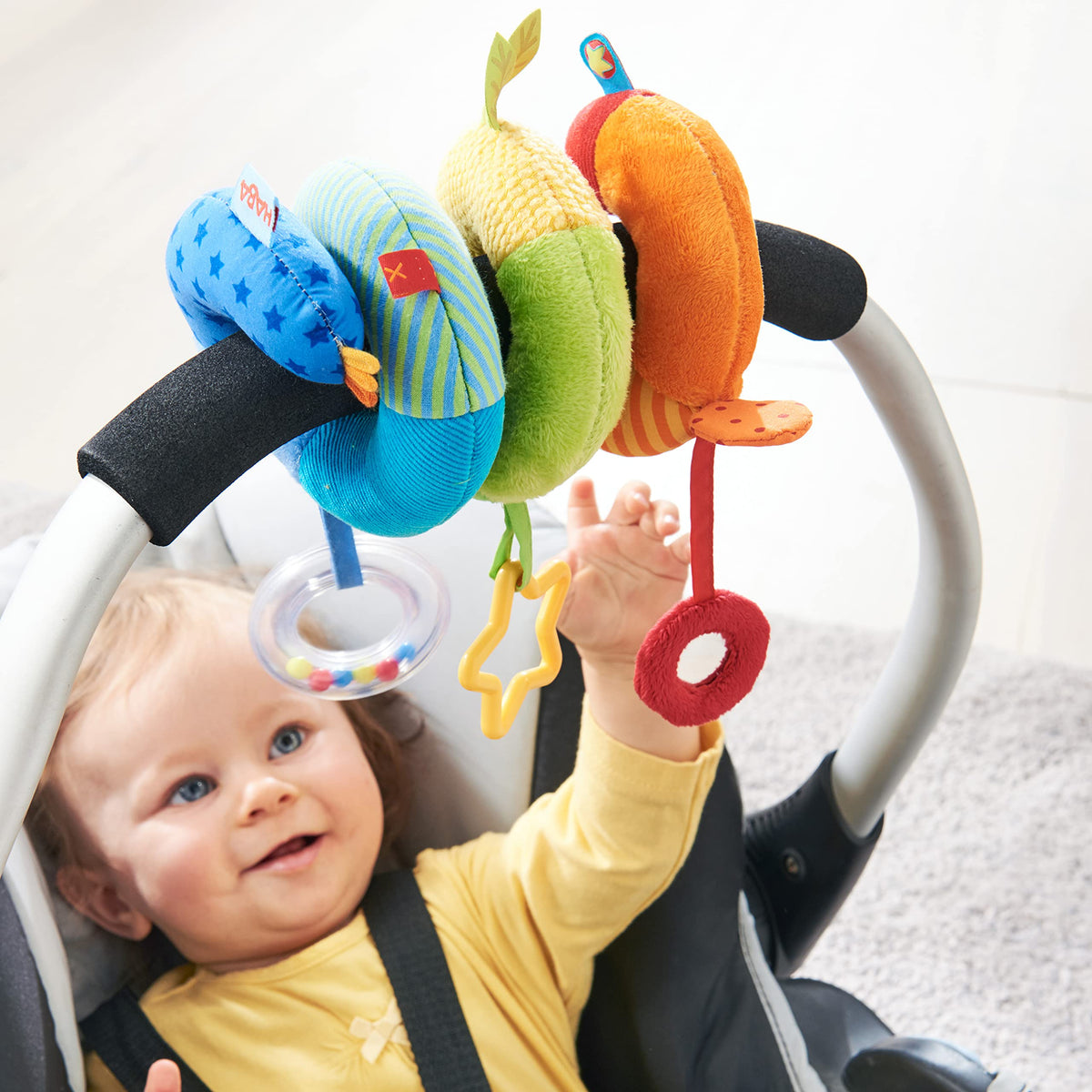 HABA Rainbow Activity Spiral: Colorful Car Seat & Stroller Toy for Baby 0-18 Months
