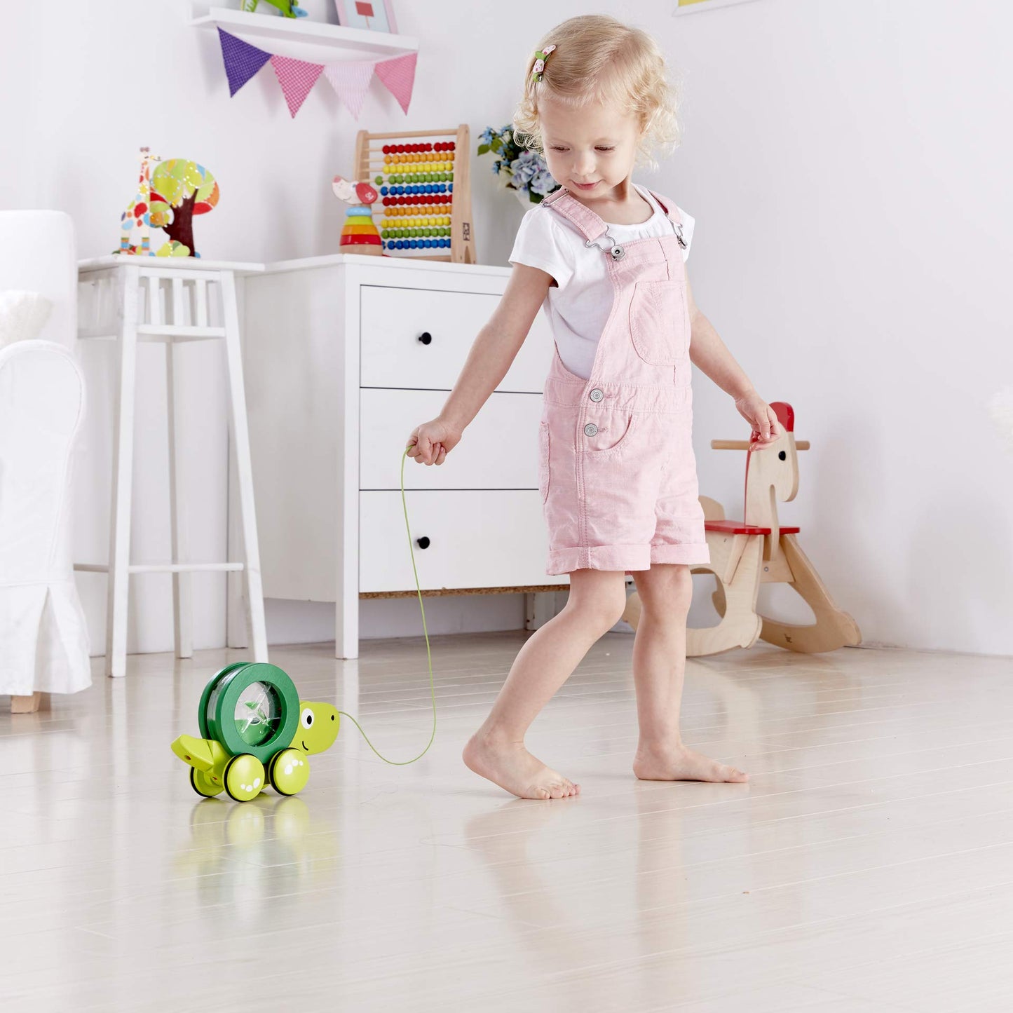 Hape Tito Pull Along | Wooden Turtle Toy with Swirling Shell – Green
