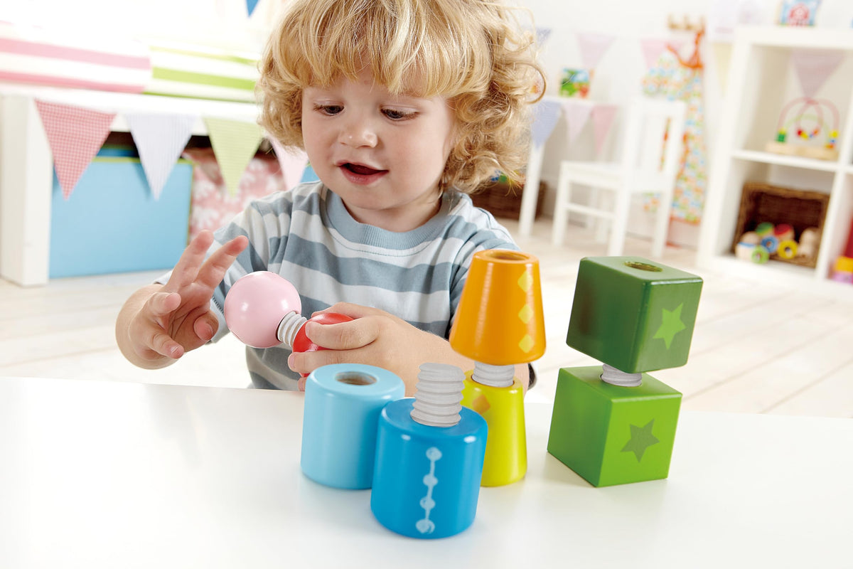 Hape Twist and Turnables Wooden Building Block Learning Set – Colorful Screw-Together Shapes for Ages 2–4