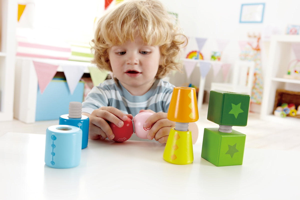 Hape Twist and Turnables Wooden Building Block Learning Set – Colorful Screw-Together Shapes for Ages 2–4