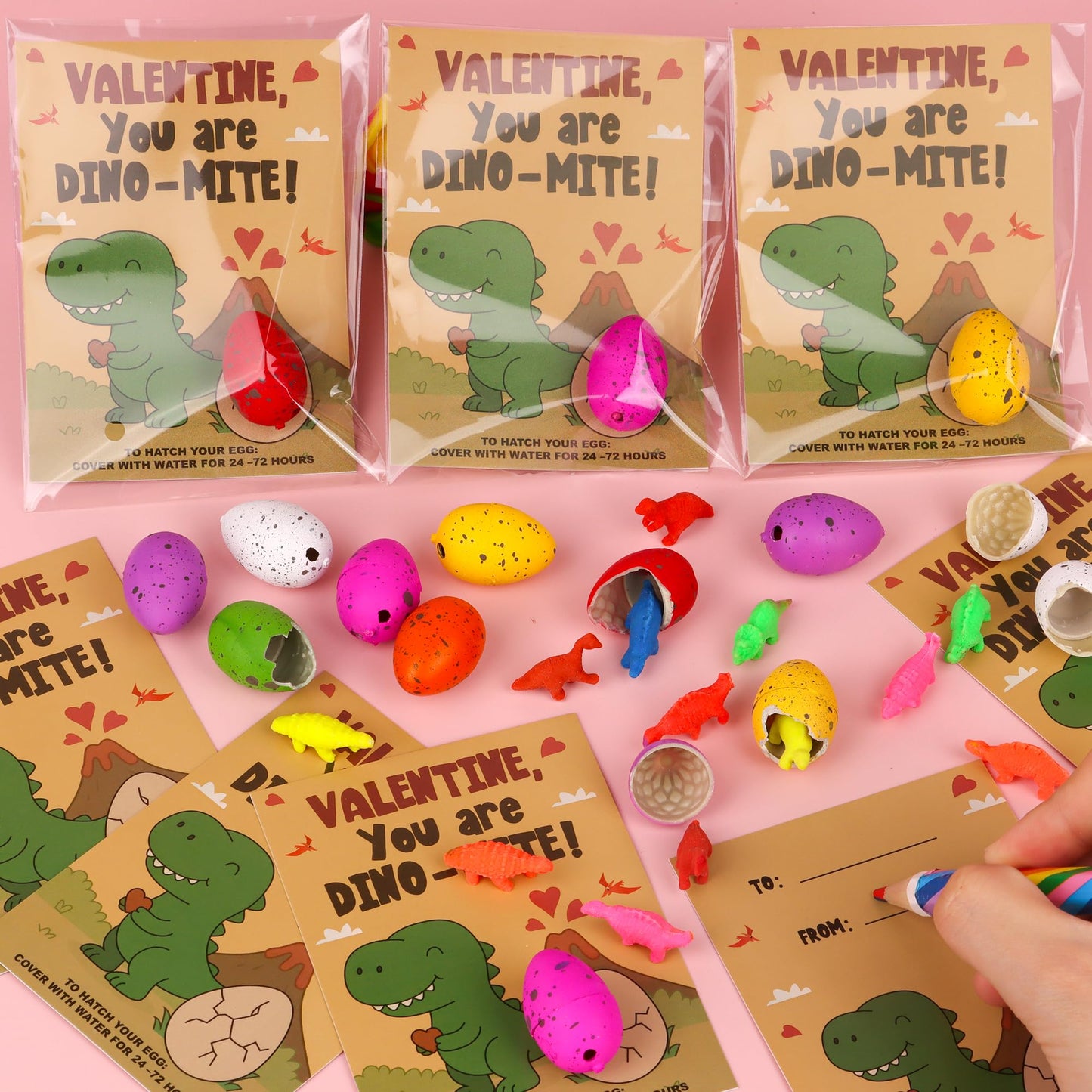 Huyamap 28-Pack Valentine’s Day Gifts for Kids: Dinosaur Egg Hatch Toys with Cards & Party Favors