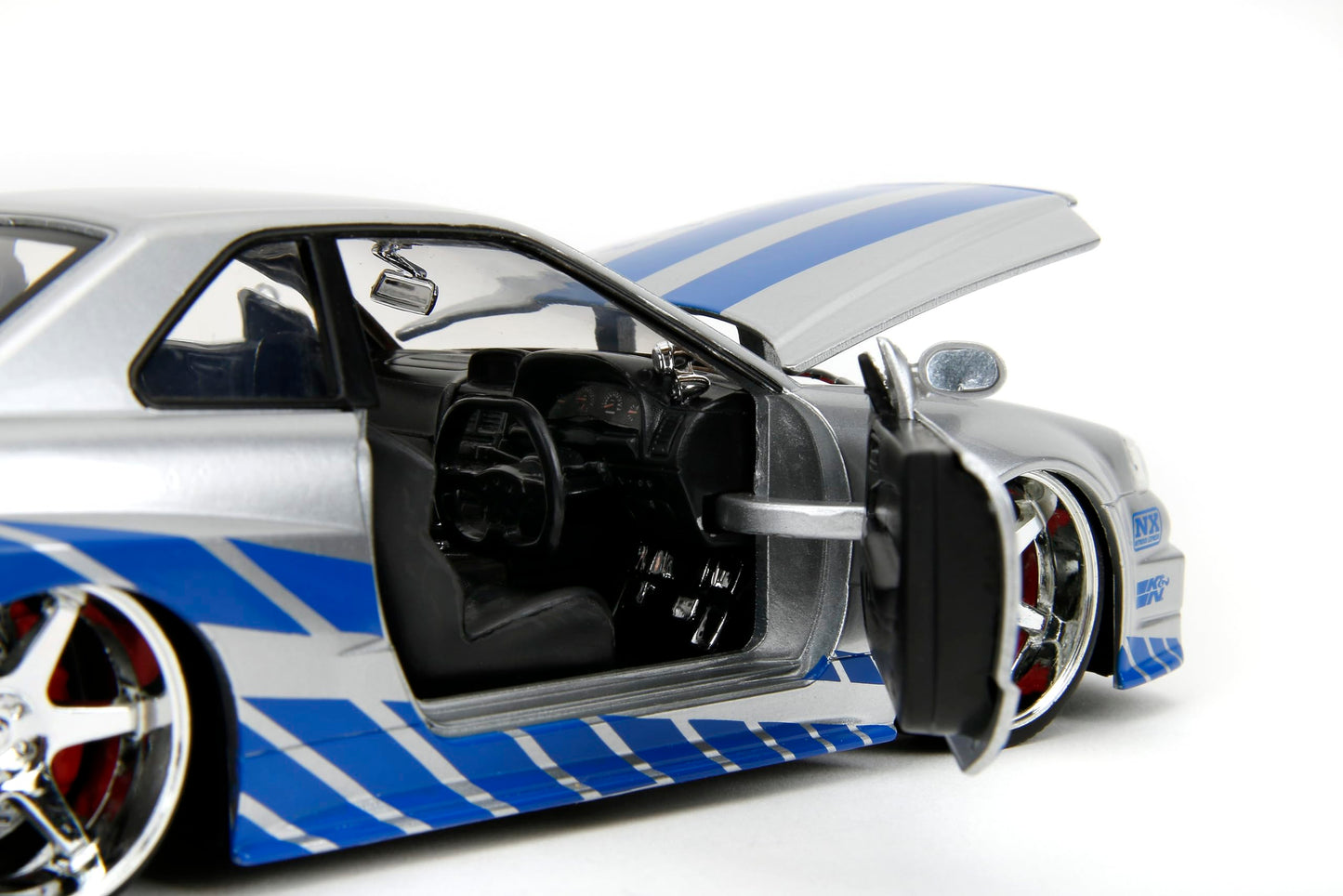 Jada Toys Fast & Furious Brian’s 2002 Nissan Skyline R34 Die-Cast Car 1:24 Scale — Silver & Blue (Licensed)